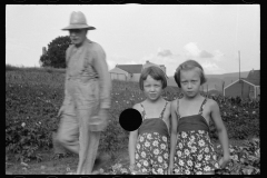 0558_Farmer and his two daughters, Tygart Homesteads