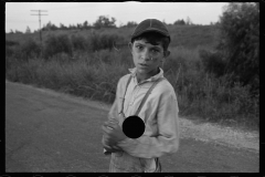 0603_Hispanic boy on road , probably Louisiana