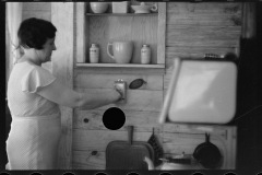 0623_Housewife in modern kitchen , unknown location