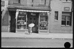 0828_Steet scene , Locksmith , woman with  umbrella