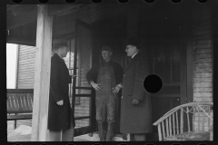 1272_Probably resettlement officials speaking with client. Possibly Ohio