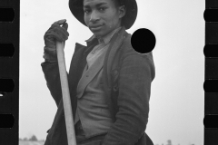 1402_young African-American  agricultural worker , unknown location