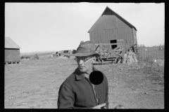 01569_Farmer contemplating his business , probably Seward County