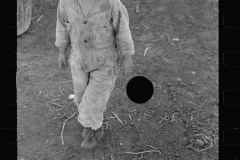 01572_Young child in stripey suit, unknown and  in unknown location 