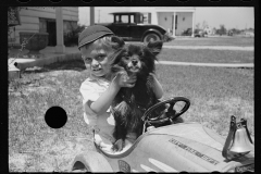 1648_Young boy in his pedal car and dog,  Decatur Homesteads , Indiana