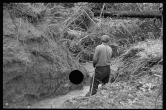 1728_Essential work , clearing ditches , watercourse, unknown location