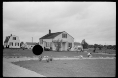 1987_Mother and child close by their new build property ,  Scioto Farms, Ohio