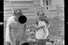 1990_Possibly sisters with kid goat ,