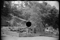 1995 _Traditional House with fencing , possibly Martin County , Indiana