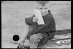 2012_Smal boy with wafer biscuit ,  Wabash Farms  Indiana