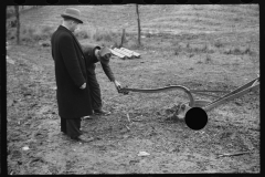 2470_Resettlement Administration agent with client and possibly broken Plough