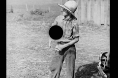 2793_Member of threshing gang taking a break  , Frederick, Maryland