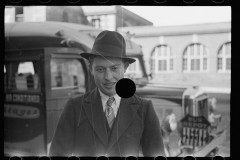 3386_Young man  in front of the bus depot. Grand Island, Nebraska