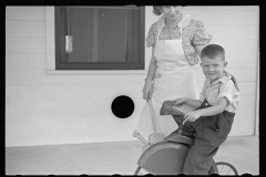 3431_Mrs Pope and son on his trike , Irwinville Farms, Georgia