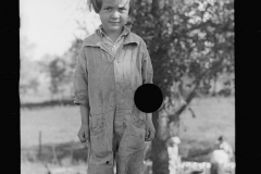 3452_Daughter of farmer at sorghum mill, Lancaster County, Nebraska