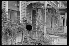 3484_ Lady tending her window-box, Omaha, Nebraska