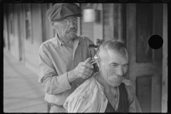 3557_Haircuts on the front porch. The "Patch," Chaplin, West Virginia