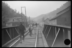 3699_Miners going home after work, children going to school