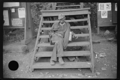 3836_Coal miner waiting for lift home. Caples