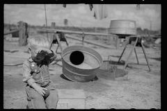 3870_ Child at the Foster farm unit. Irwinville Farms, Georgia