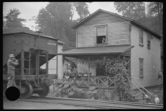 3879_Train hauling  coal through centre of  Osage, West Virginia