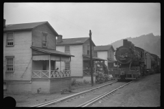 3882_Train hauling  coal through centre of  Osage, West Virginia