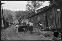 4004_Relief truck brings food  to abandoned mining town