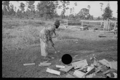 0058_African-American boy chopping wood
