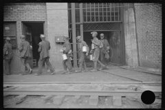 3842_Miners handing  in their  lamps Caples