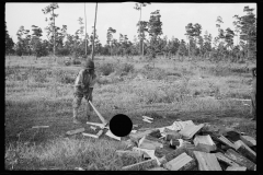 0057_African -American  boy chopping wood