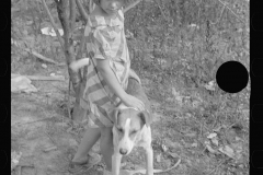 0427_Child with dog , probably of family of  ten, Brown County, Indiana