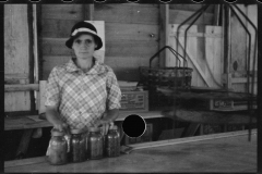 0607_Woman with Kilner jars, unknown location