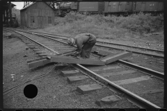 0745_Track worker cutting a steel section with a welding torch , unknown location