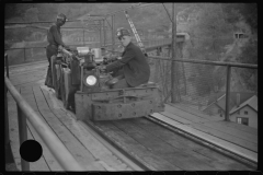 0751_Mine train with two miners , Maidsville, West Virginia
