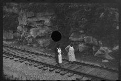 1035__Two women walking the tracks , Omar, West Virginia