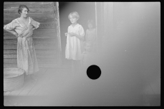 1039_Trische family, tenant farmers, Plaquemines Parish, Louisiana.    Light ingress on negative.