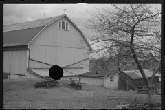 1225_Large new barn with harrow behind , unknown location