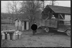 1232_truck in yard of probable dairy farm ( churns) , unknown owner and location