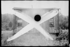 1242_ruined shack , spoiled negative ,    unknown location .