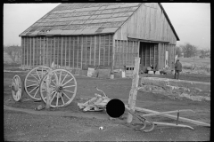 1296_Large barn and wagon chassis, unknown location