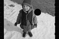 1358_ Small boy in snow ,   probably Westmoreland Homesteads