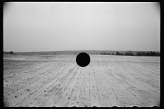 1401_  Open snowy landscape , agricultural land , unknown location.