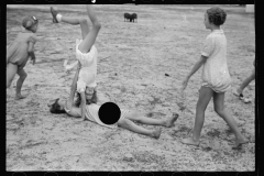 01553_Children in the school play area , possibly supervised gym .