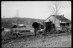 1628_Horse alongside long wheeled contraption  , Tennessee