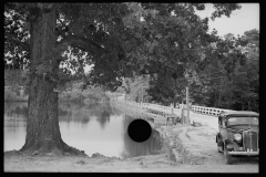 1716_Bridge by or over lake , unknown location