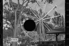 1886_Ferris wheel at travelling fair ground , location unknown
