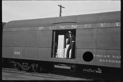 1911_Smartly dressed gent in Pennsylvania Railroad boxcar, Hagerstown MD