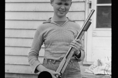 1975_Young lad with simple rifle ,  Decatur Homesteads