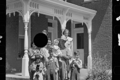 1993_Large happy well dressed family in front of their house , Scioto farms, Ohio