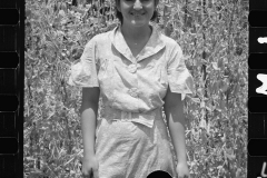 2090_Rehabilitation client with basket of English peas, farm near Batesville